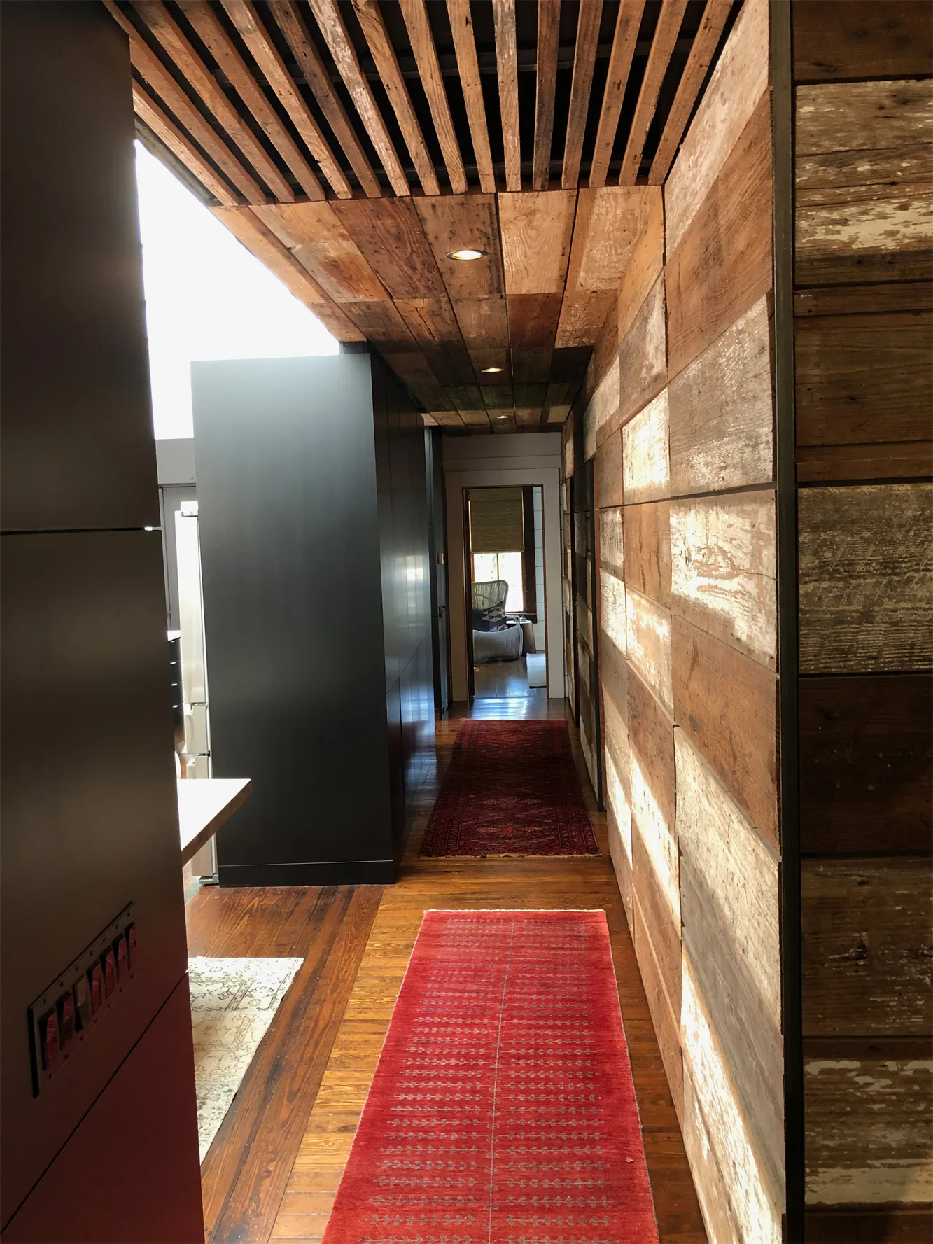 Reclaimed wood hallway through the house