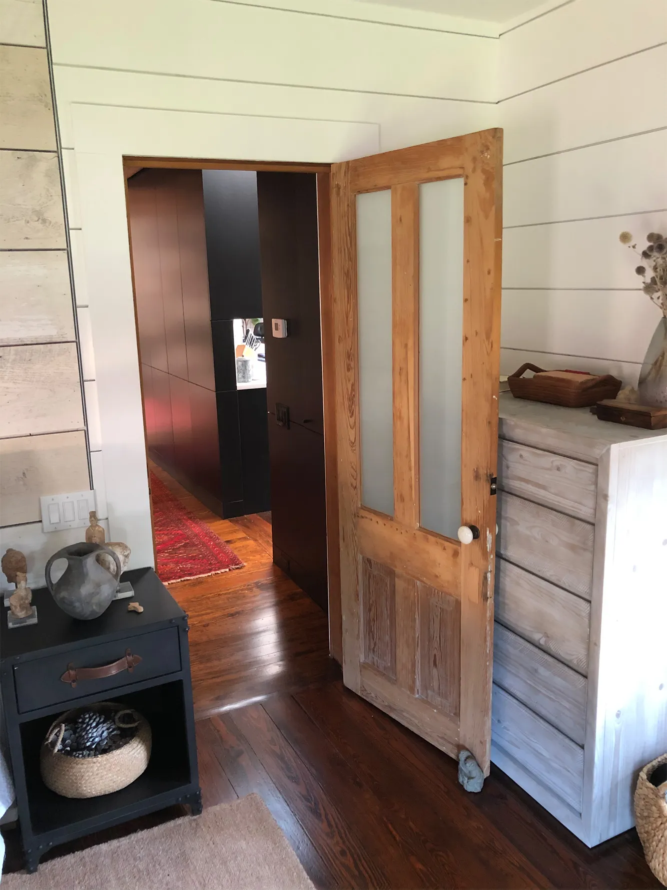 Restored wood doors and new finishes inside a Houston home built out by VCS