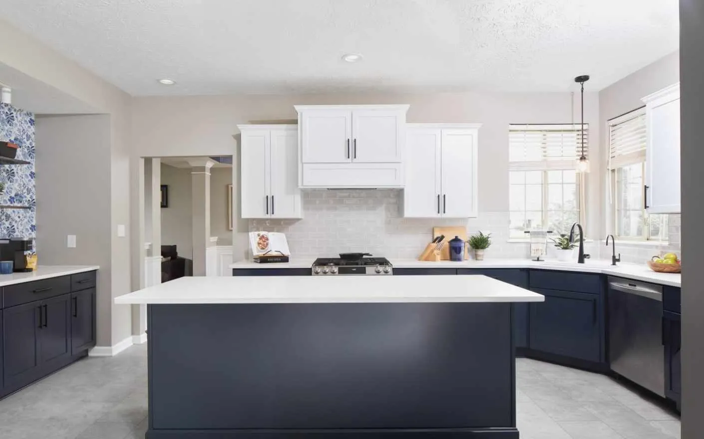 Kitchen remodel finished with a navy island