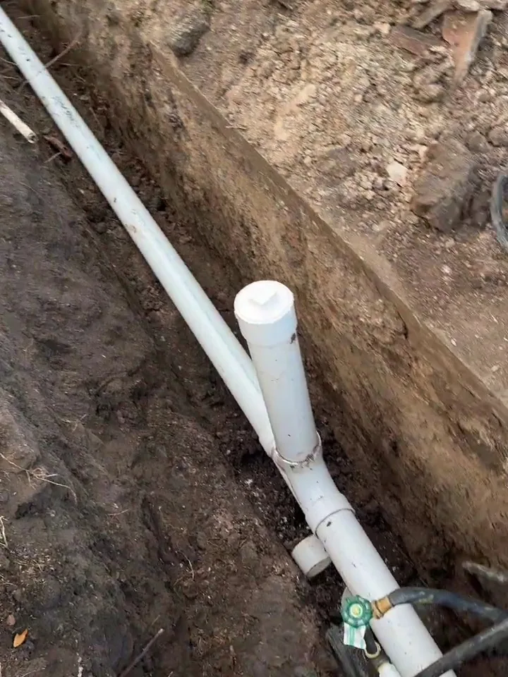 New cleanout riser on a replaced sewer line in Houston, the capped pipe where a sewer camera goes in